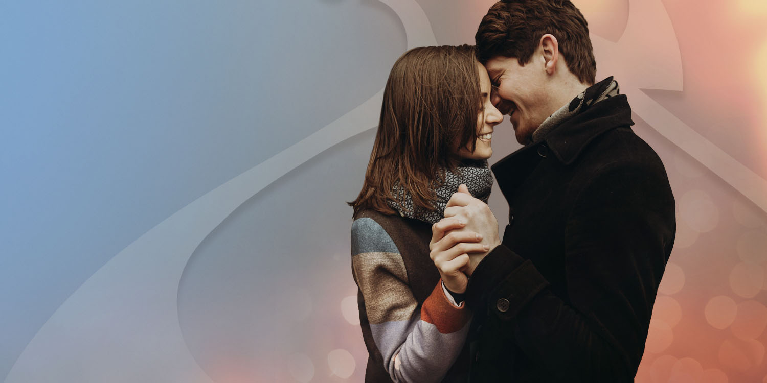 Young couple dancing together in Fall